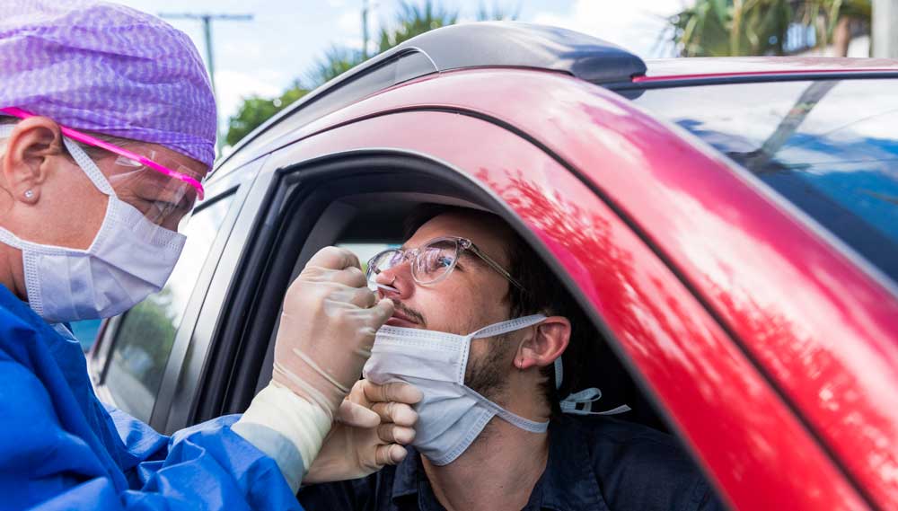 Image:Essential workers who are self-isolating can book a test directly. Other keyworkers can select a regional test site drive-through appointment or home test kit. Home test kit availability will initially be limited. Image: Getty Images