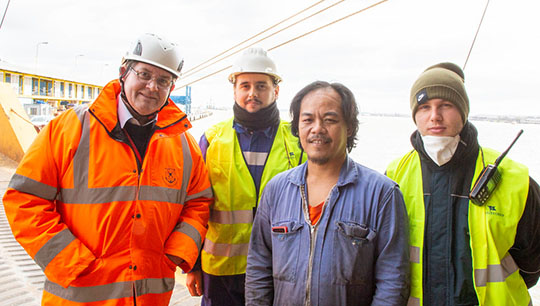 Image:Stella Maris chaplain John Fogerty, left, with seafarers at Dover Image: Stella Maris