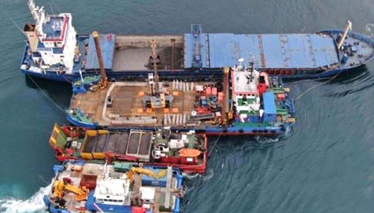 Image:Salvage barges alongside Kaami. Image: MAIB report courtesy of MCA