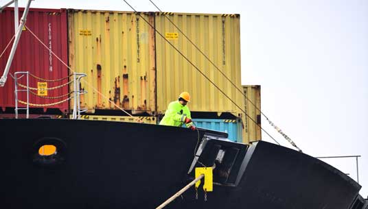 Image:Before a vessel arrives in port, crew need to sanitise all access areas for shore-based dockworkers. Image: Danny Cornelissen