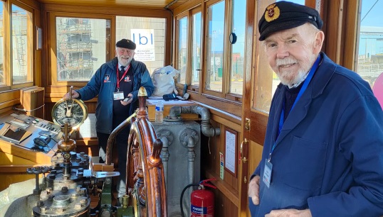 Image:The Danny's skipper Captain David McNamee (front) with retired Mersey maritime pilot Stuart Wood during a previous occasion onboard the vessel. Images: SS Daniel Adamson