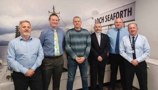 Image:L-R: liaison officers Gary Calderwood, Iain MacKenzie, Daniel Wright, Allan Dickson and James Christie with Nautilus head of industrial Micky Smyth at the JCC meeting. Image: Nautilus International