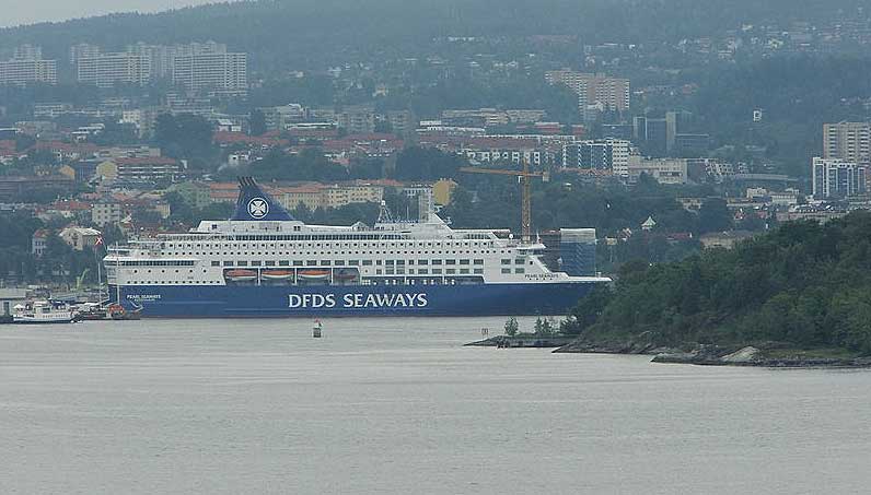 Image:A DFDS ferry in Oslo where services are currently suspended, along with Oslo and Amsterdam Newcastle services. Ferry services remain in operation in the English Channel and Baltic Sea, while sailings to France are only for freight and essential travel. Image : Wikimedia Commons