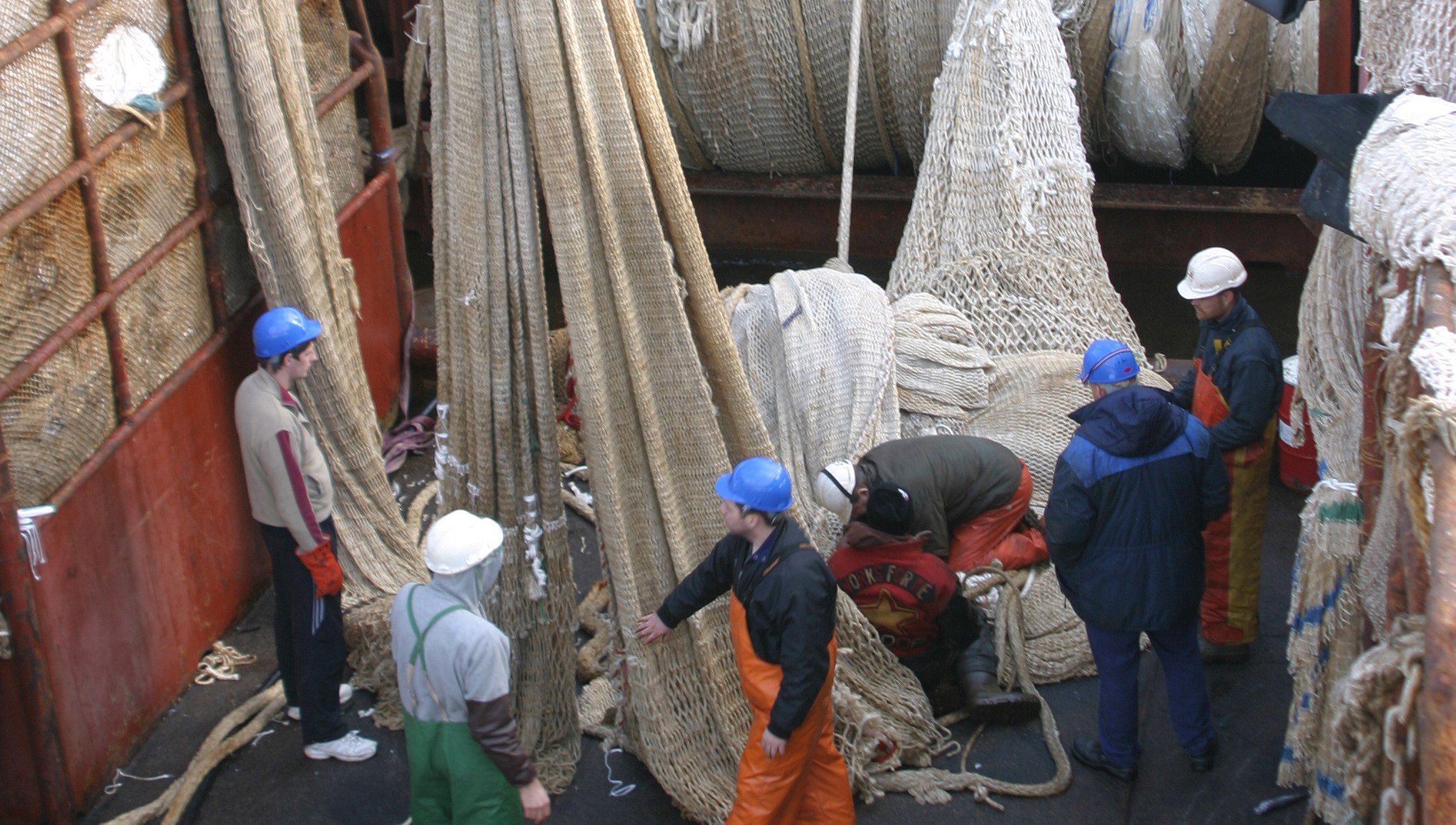 Image:Net repairs. Image: Douwe Adema Nautilus member - Nautilus/Inmarsat 'Life at Sea' Photocompetition 2019.