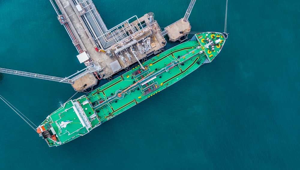 Image:Aerial view of a crude oil tanker under cargo operations on atypical shore station.  Image: Getty Images