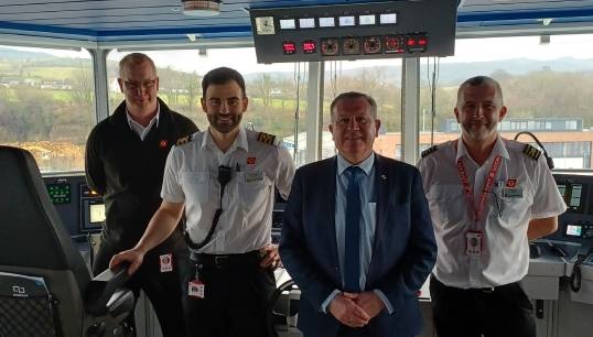 Image:Nautilus head of industrial Micky Smyth on the bridge of the Glen Sannox with members. L-R: Captain Andrew Gill, Chief Officer Marino Giorgetti, Mr Smyth and Captain Greg Clark. Image: Nautilus International