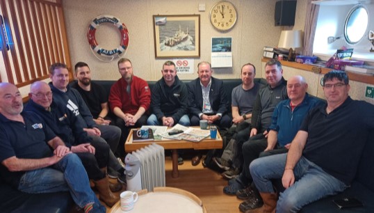Image:Head of industrial Micky Smyth (fifth from right) with members onboard RV Coryestes. Image: Nautilus International