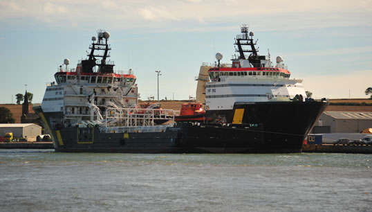 Image:Two of the four  vessels at the heart of negotions: Caledonian Vanguard and Caledonian Vigilance at Montrose, Angus, Scotland in 2013 .Image: Wikimedia Commons