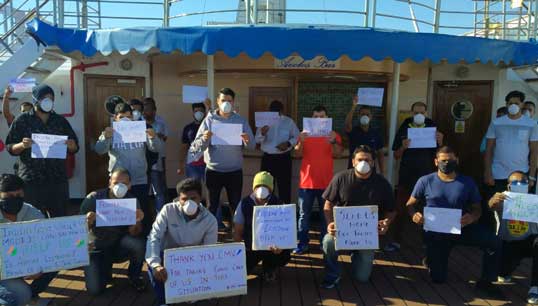 Image:Cruise crew on the Astoria who went on a hunger strike after being stuck on board their vessel without pay.