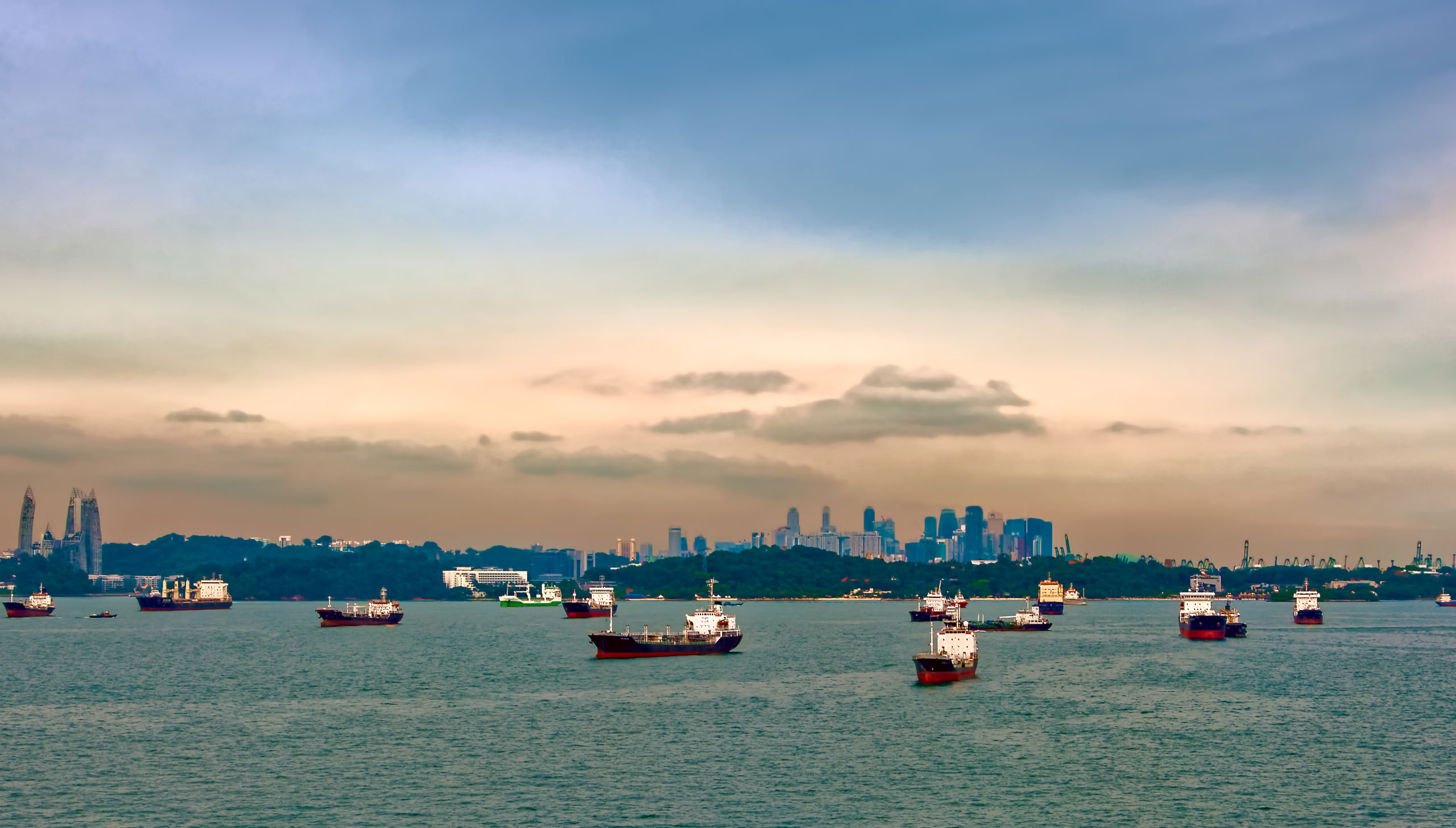 Image:Cargo ships waiting to enter the Port of Singapore. Image: Getty Images