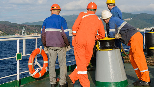 Image:'No crew change' clause are demanded by certain charterers, and state that no changes can occur while the charterer's cargo is onboard – meaning ships are not allowed to deviate to ports where crew changes could take place. Image: IMO