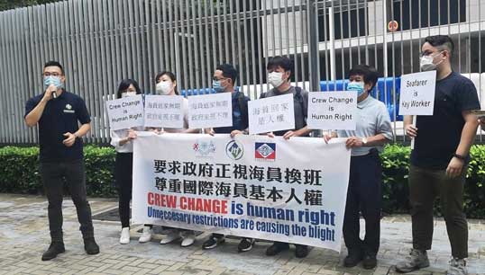 Image:Hong Kong ITF inspector Jason Lam explains the petition demands to the press with Union representatives.