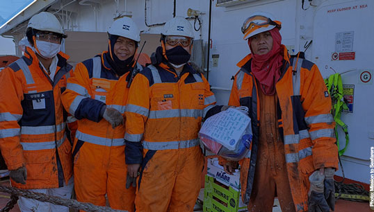 Image:The crew change crisis was considered by the IMO's maritime safety committee. Image: IMO meetings by Mission to Seafarers.