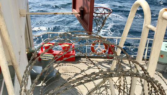 Image:Example of razor wire fencing used in 'vessel hardening' measures employed when a ship passes through high risk areas. Image: Getty Images