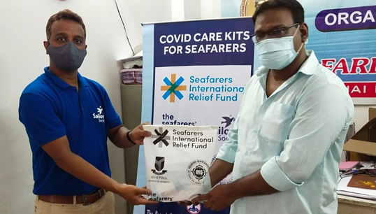 Image:Sailors' Society port chaplain Joel Das helping with the distribution of Covid Care Kits in Calcutta. Image: Sailors' Society