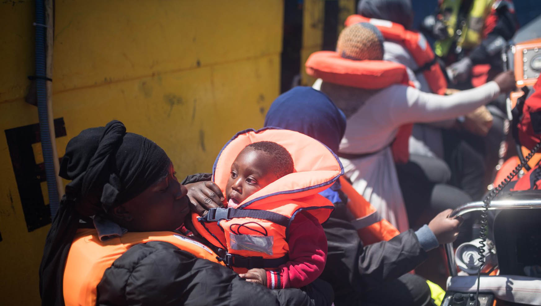 Image:Women and children disembark Sea-Watch 3. Image: sea-watch.org