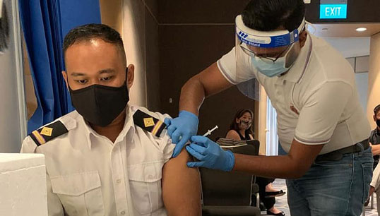 Image:The first Singaporean seafarer to be vaccinated, Muhamad Nashrin Bin Ayub. Image: Singapore Maritime Officers' Union
