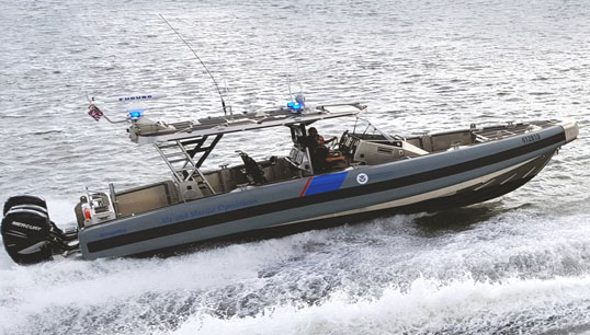 Image:In some cases cases Customs and Border Patrol officials have required that seafarers be constantly guarded or that their ship remain in port until the crewmembers' flights home have taken off. Image: US customs and border maritime intercept patrol vessel, Wikimedia Commons