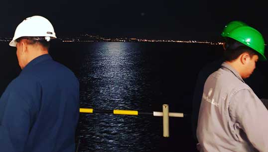 Image:Crew at work on a cruisehip at night. Image: Nautilus 2020 photocompetition entry by member Voirrey Blount.