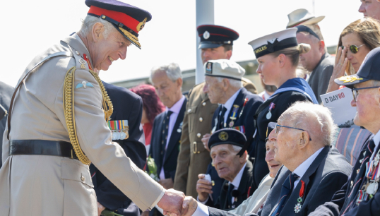 Image:King Charles greets Second World War veterans on the 80th anniversary of D-Day in June 2024. The King is due to give a televised address on the 80th anniversary of VJ Day in August 2025, but will he acknowledge the 'Forgotten Fleet'? Image: Wikimedia Commons