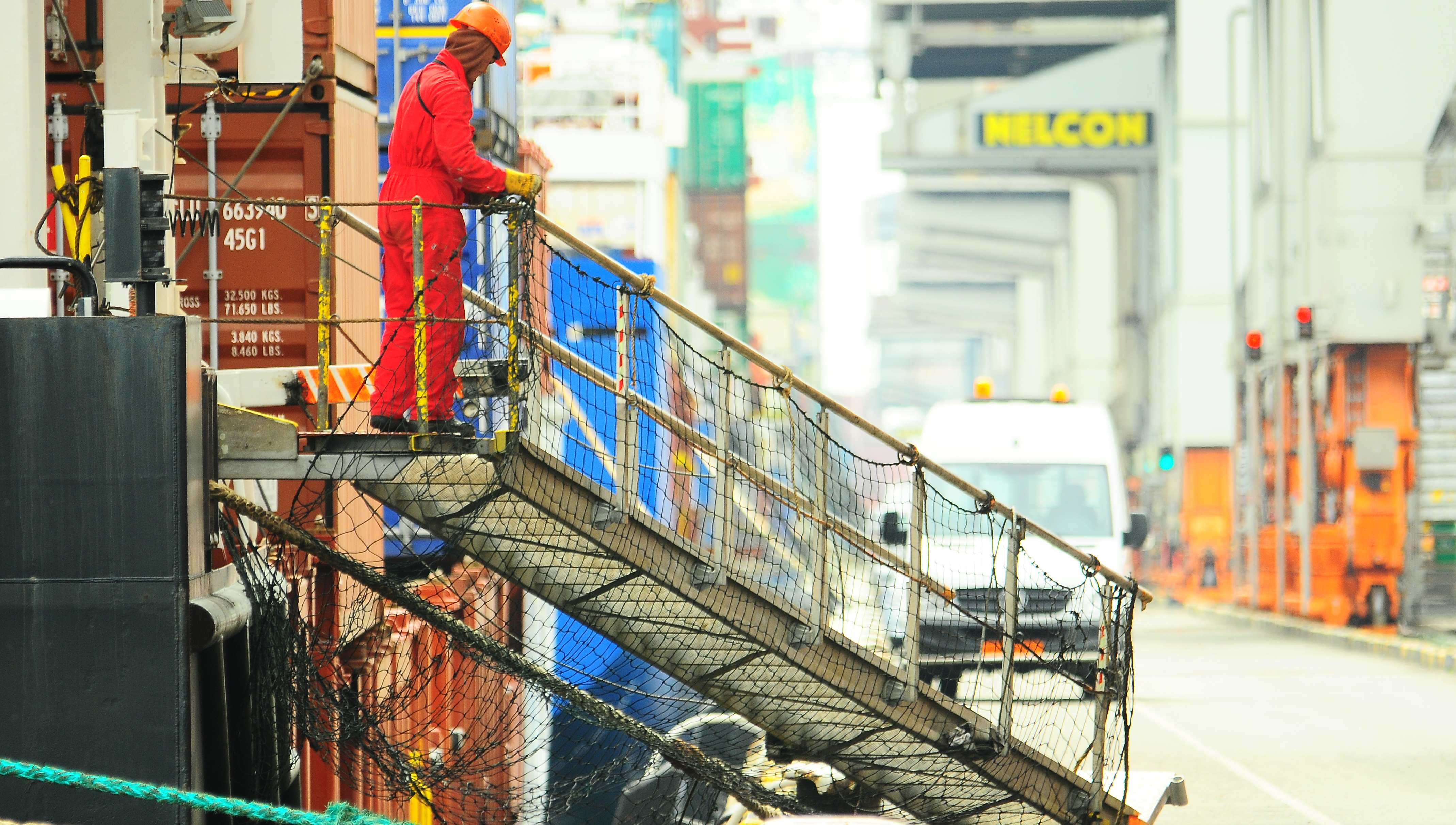 Image:Containership crew at work: the social partner say a diverse range of onshore and onboard skills required to operate merchant vessels from the UK ports network must be protected from long term damage. Image: Danny Cornelissen