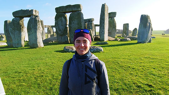 Image:Nic Gardner at Stonehenge pre-Covid: she used the pandemic and lockdown to retrain.