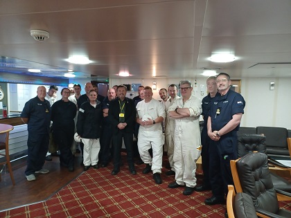 Image:Nautilus national organiser Steve Doran, centre, with RFA members onboard Fort Victoria. Image: Nautilus International