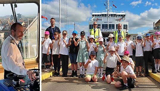 Image:Captain Ian Henderson (L) showed school children how crew sail the Solent during a voyage marking a partnership between schools and the Wightlink ferry company to highlight maritime careers. Images: Ian Henderson/Wightlink