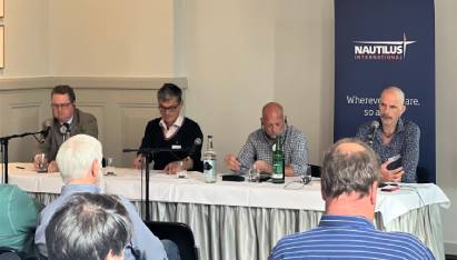 Image:Symposium speakers from left to right: Mark Dickinson, Wolfram Siede, Kevin Rowan Holger Schatz