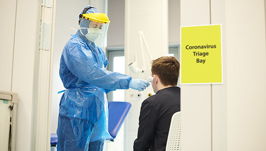 Image:The officers are now en-route to join their ship following a negative test. 