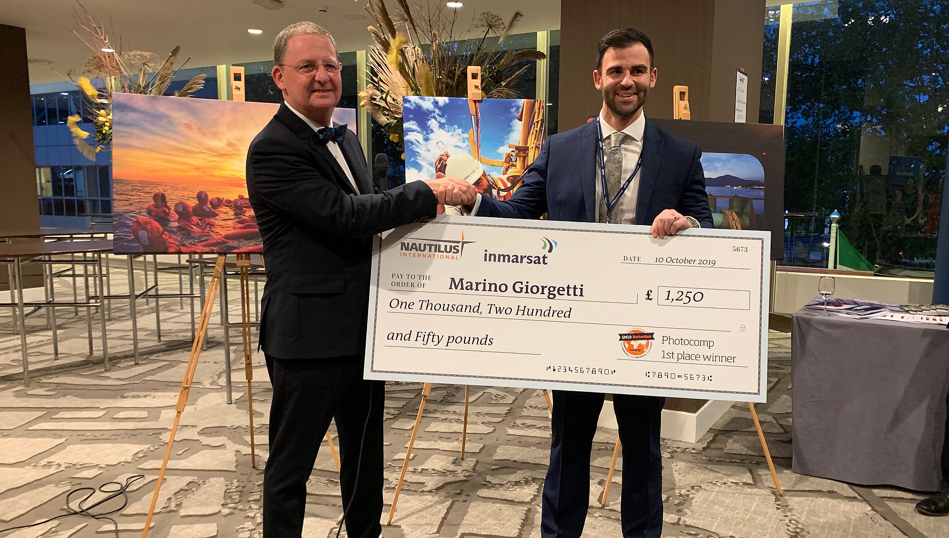 Image:Nautilus/Inmarsat photo competition 2019 Life at Sea winner Marino Giorgetti is congratulated by Nautilus general secretary Mark Dickinson