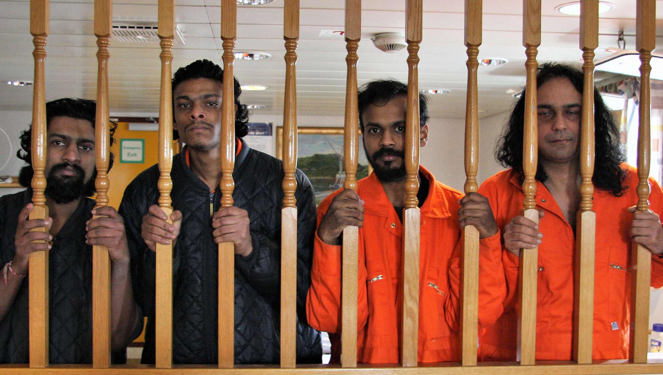 Image:The four seafarers who were stranded on the support ship Malaviya Twenty. Image: Maurice Gray