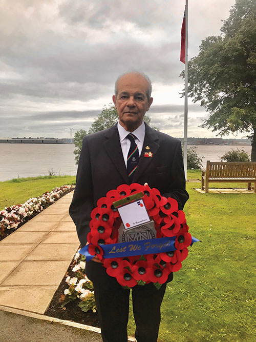 mariners_park_resident_anthony_gatt_with_wreath_webinsert.jpg