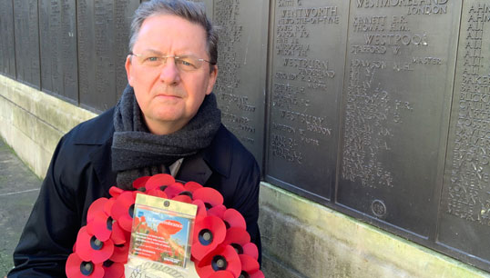 Image:General Secretary Mark Dickinson with the wreath laid on behalf of Nautilus at the Merchant Navy Memorial in Tower Hill, London.