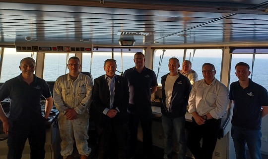 Image:Crew aboard the MV Hrossey met with Nautilus national organiser Steve Doran in April. 