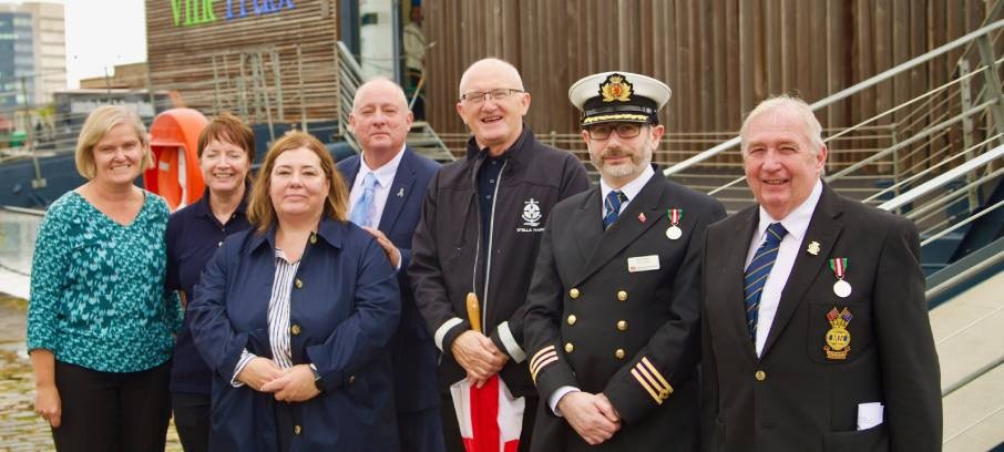 Image:Union officials attending an event after the Leith service on  the Vine Trust Tom Dunn barge were: Nautilus Council member Allan Dickson MNM (2nd from right), Nautilus Welfare Fund caseworker Iain Lindsay (4th from left), and Nautilus ITF inspector Helen Meldrum (3rd from left).  Image: S Hurst