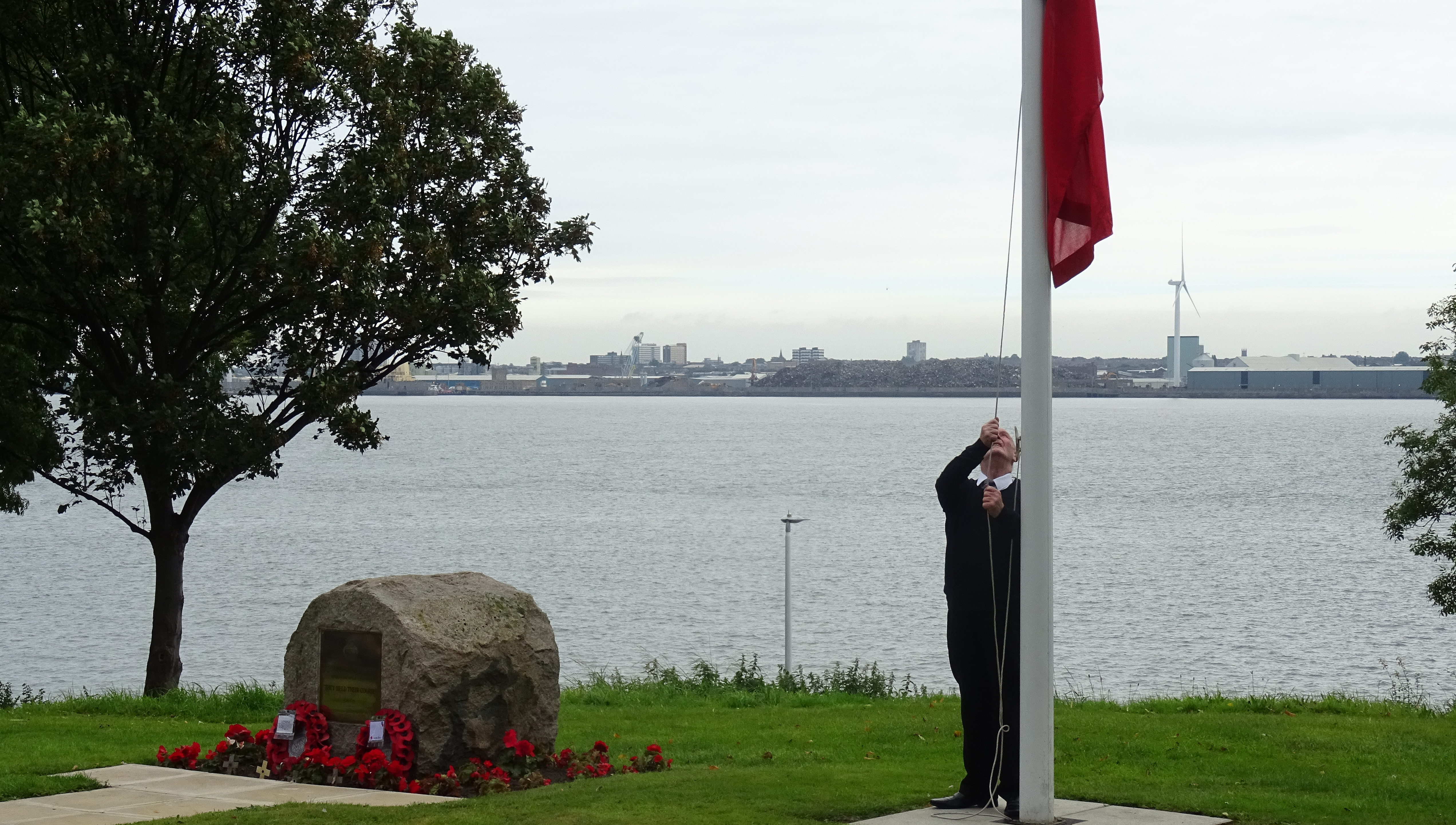 Image:Flag raising ceremonies are held beside the Memorial Stone on the Nautilus Welfare Fund's  Mariners' Park Estate in Wallasey, UK. Image: Nautilus International