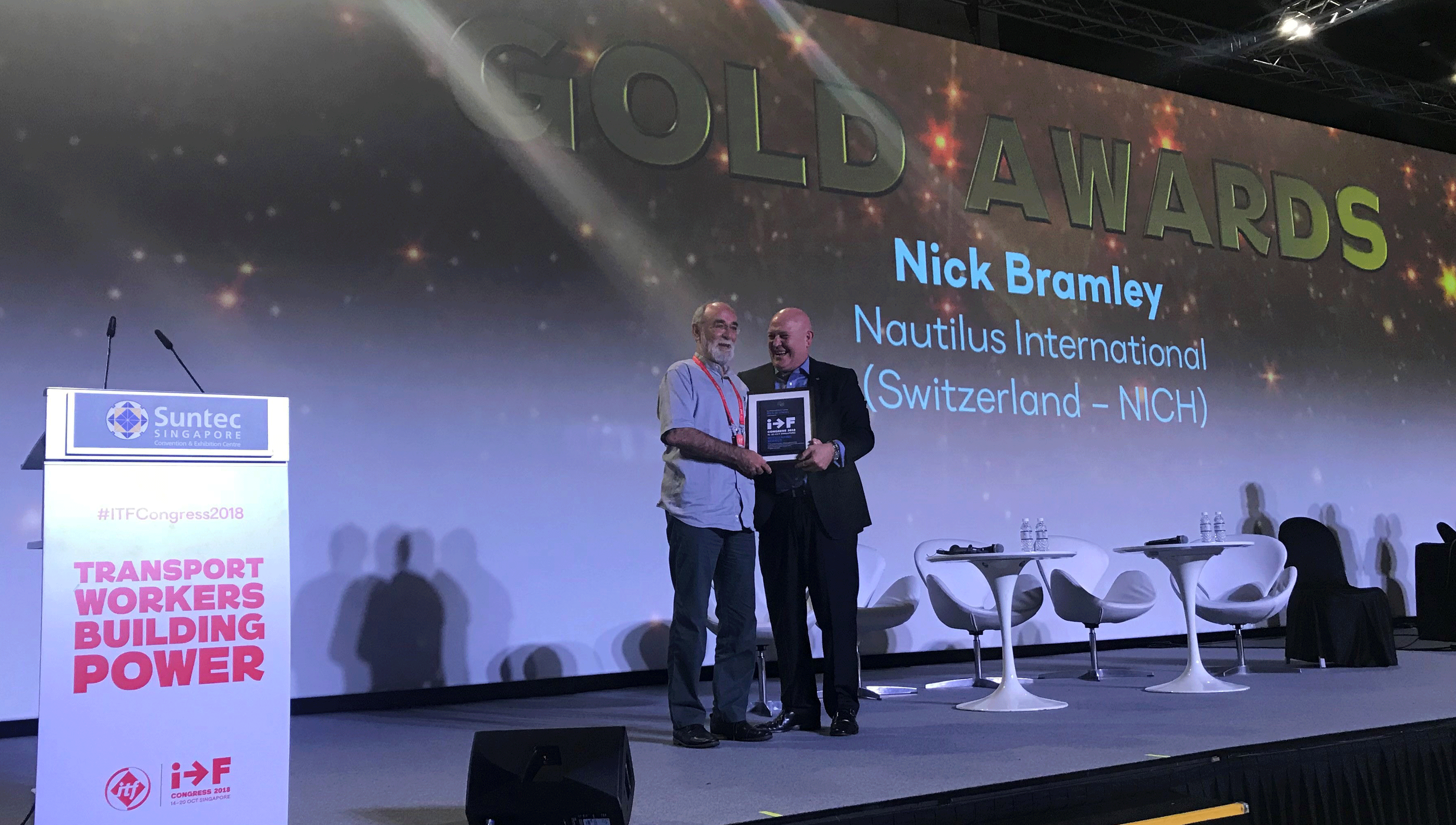 Image:Nick Bramley (left) is presented with the International Transport Worker's Federation Gold badge for distinguished service by ITF general secretary Steve Cotton