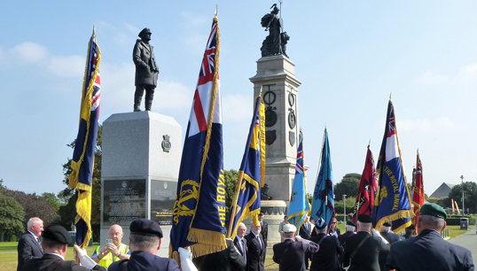 Image:A standards march for Merchant Navy Day celebrations  at the Plymouth Merchant Navy Monument. Image: Paul Wright