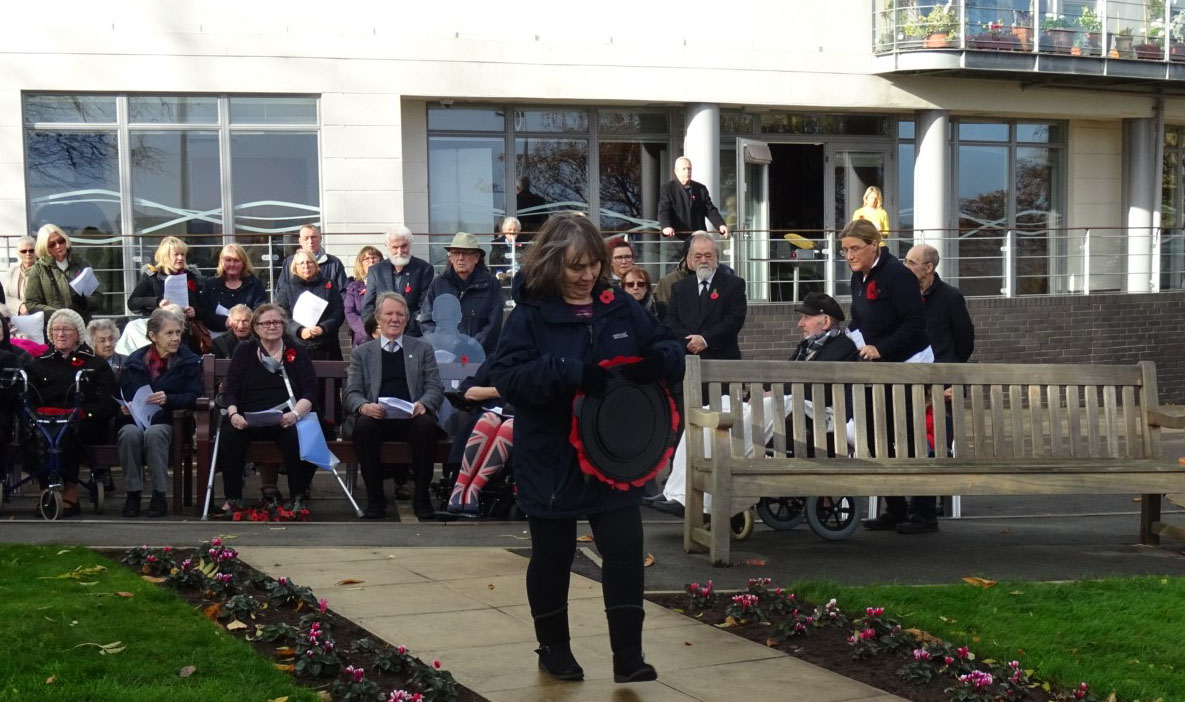 Image:Longest-serving Mariners' Park staff member Karen Jones laid the red poppy wreath during the ceremony.