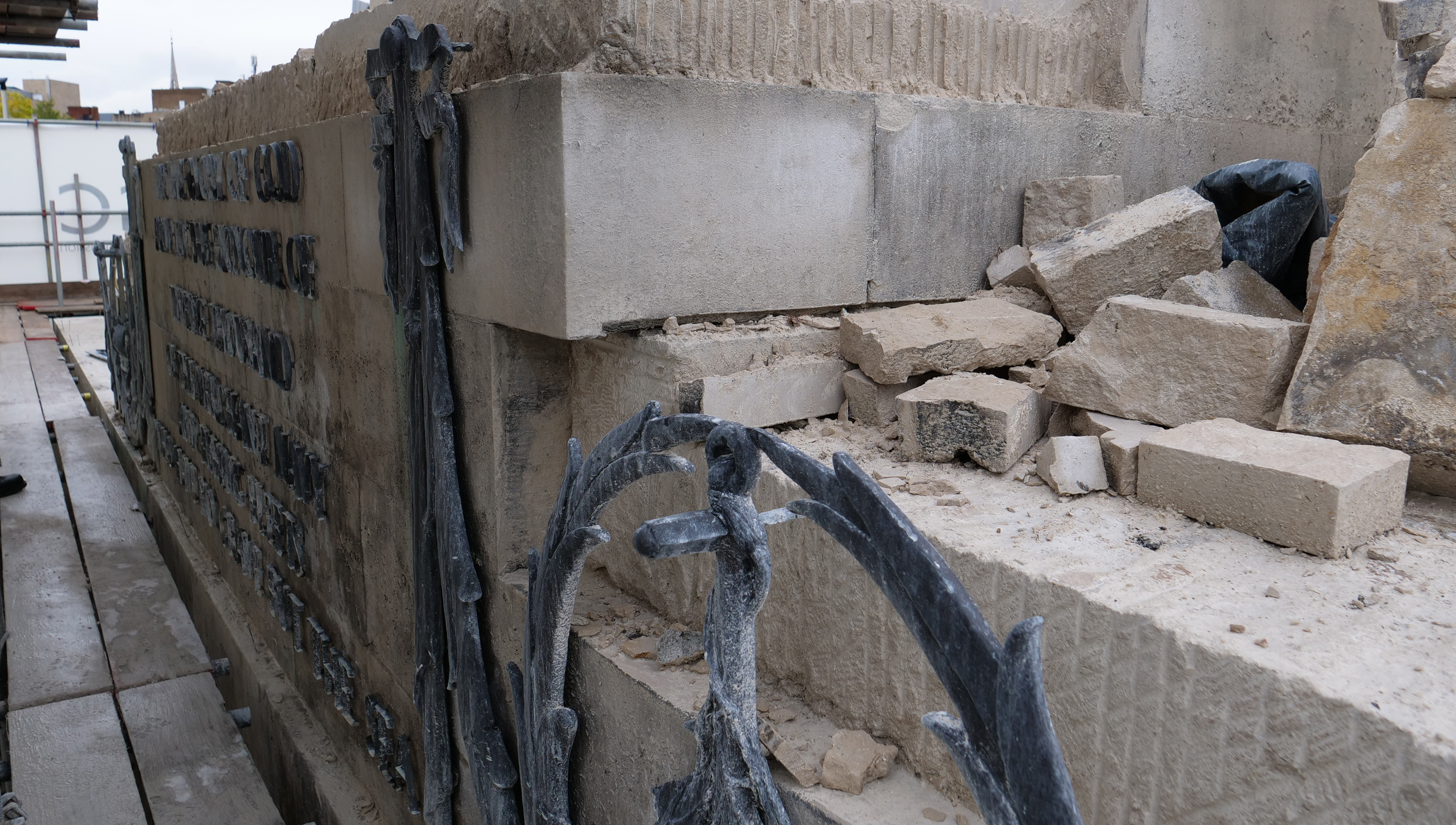 Image:Repairs to the stonework being carried out on the First World War section of the Merchant Navy memorial at Tower Hill. Image: Commonwealth War Graves Commission