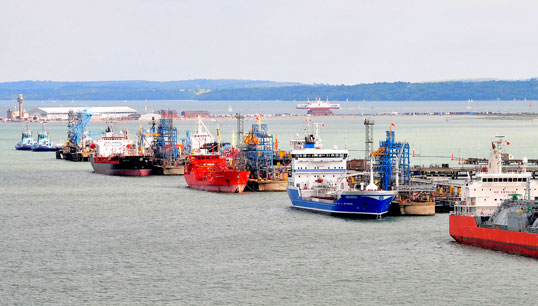 Image:The UK Fawley Oil Terminal in Southampton Water, with the observation tower at Calshot Spit, far left, for controlling traffic on this busy waterway. Image: Mike McBey/Wikimedia Commons