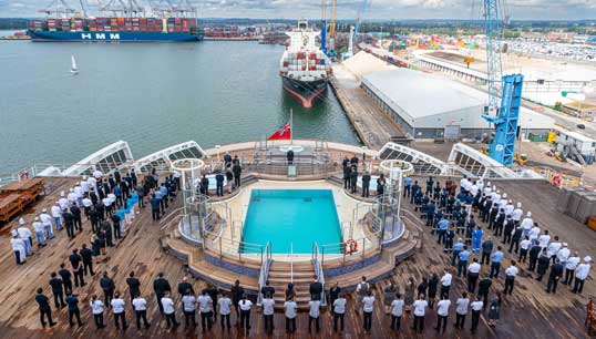 Image:When the liner Queen Mary 2 docked in Southampton after its latest Atlantic crossing, Nautilus members and their shipmates held a minute' silence with the red ensign at half-mast in remembrance of Her Majesty Queen Elizabeth II. 'It is probably the most difficult broadcast I have ever had to make as captain when I announced the death to our 3,500 passengers and crew onboard,' said Captain Aseem Hashmi.  Image: Cunard Line
