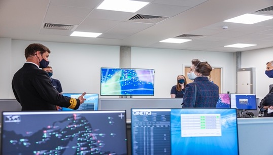 Image:RAdm Andrew Burns discussing platform enabled training capability. Image: QinetiQ