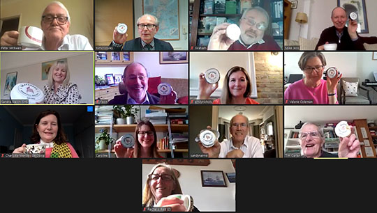 Image:SHS staff and trustees marked the occasion on zoom with a cup of tea and a slice of birthday cake. 