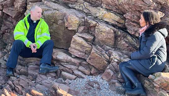 Image:Reverend Tom Ebbens, the MCA's first full-time chaplain, during an interview with BBC presenter Gemma Hunt (Songs of Praise). Credit: HM Coastguard
