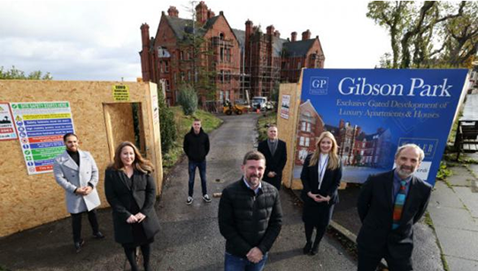 Image:Nautilus Welfare Fund's Mick Howarth (front right) with representatives from Prospect Capital, Mason Verdi and Karl Tatler at the entrance to Gibson Park.