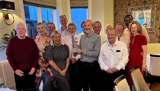 Image:Mick Howarth, middle, during a farewell event for his retirement as Nautilus Welfare Fund manager. Image: Nautilus International