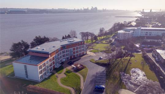 Image:Nautilus House sits in the foreground looking towards the Trinity House Hub and the Care Home within the Mariners' Park Estate in Wallasey, UK. Image: Jamie Beard/Nautilus International 
