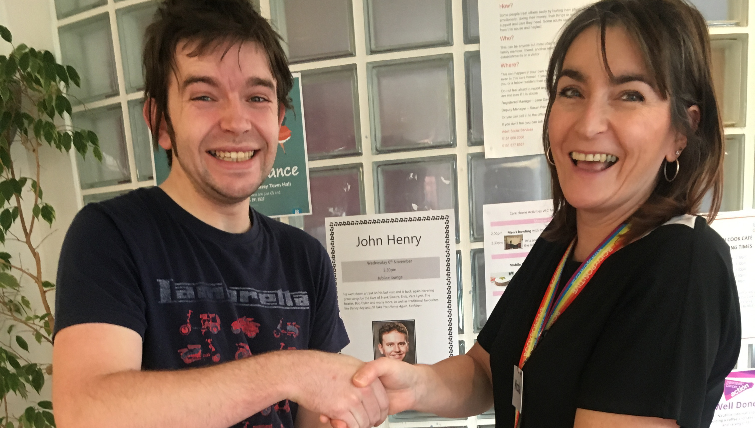 Image:Connor Dunphy is congratulated on his welfare fundraising efforts by Nautilus Care Home activities co-ordinator Nicola Burns.